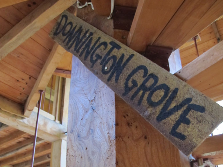 A photo taken of a hand made sign reading Donnington Grove.